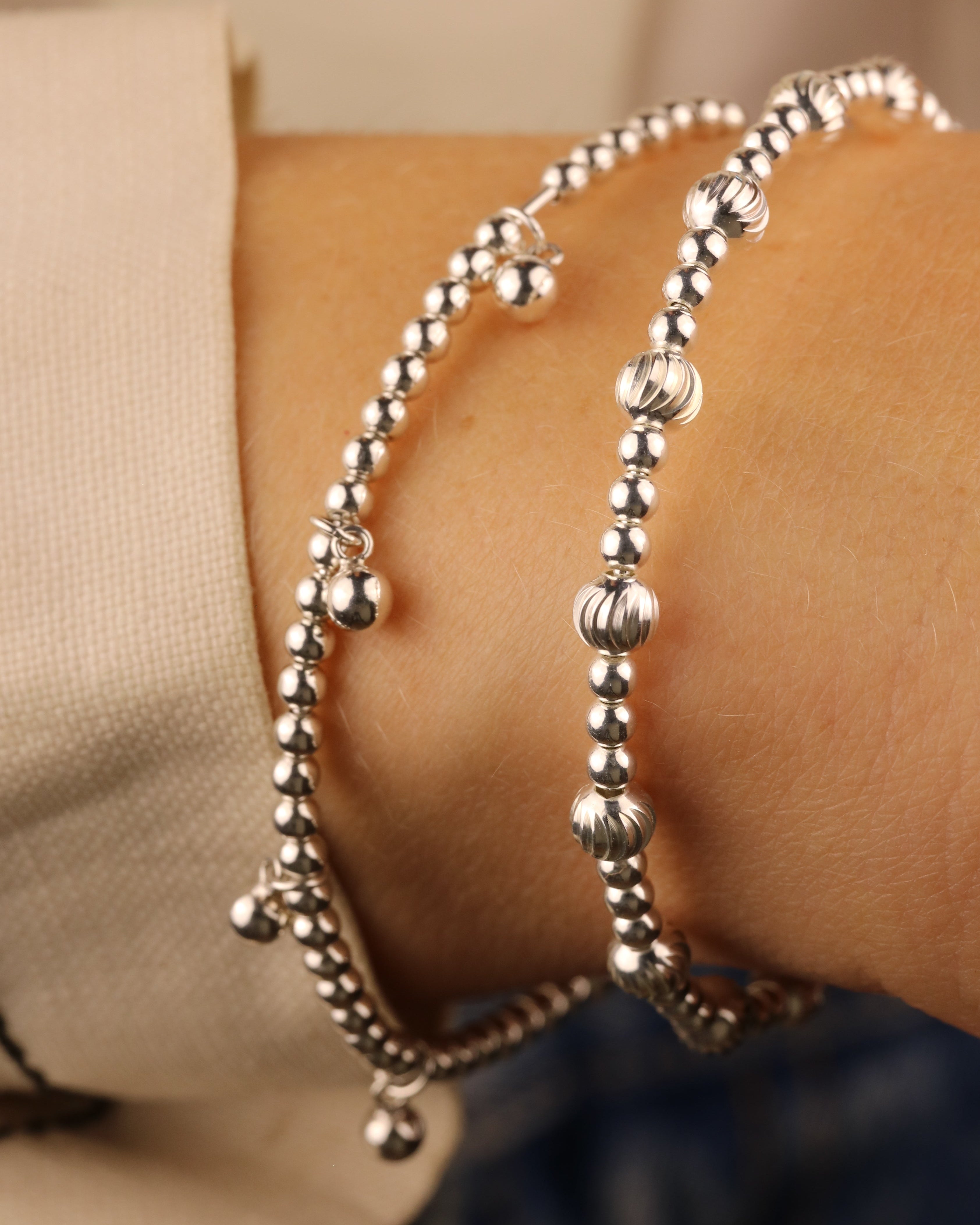 Aura II silver wire bracelet on model – Omasi Collection Finland