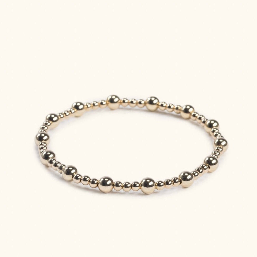 Aurelia gold-filled stacking bracelet flat lay – handmade minimalist jewellery Finland