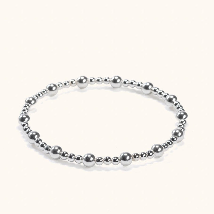 Aurelia silver stacking bracelet flat lay – handmade minimalist jewellery Finland
