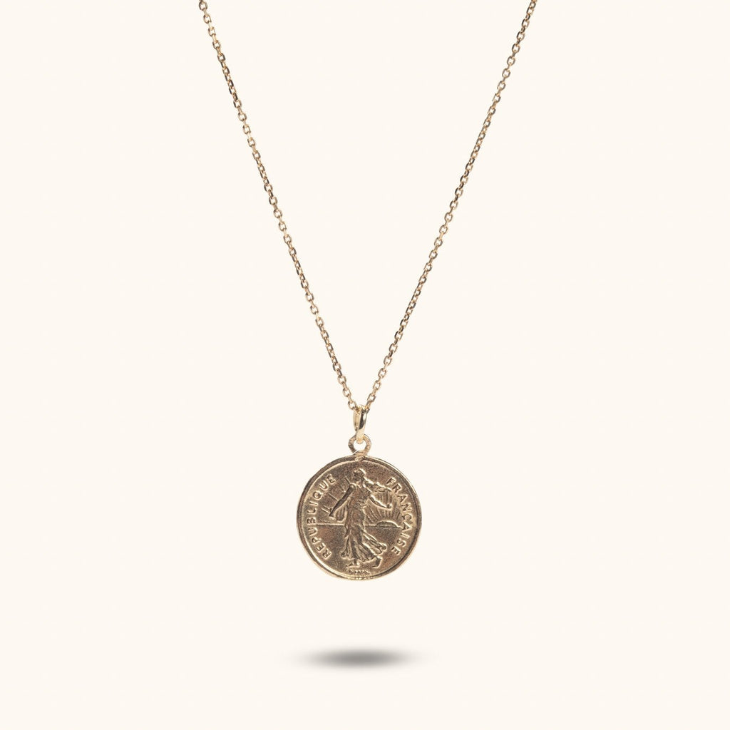 Bellara gold-plated French coin pendant necklace flat lay – Omasi Collection