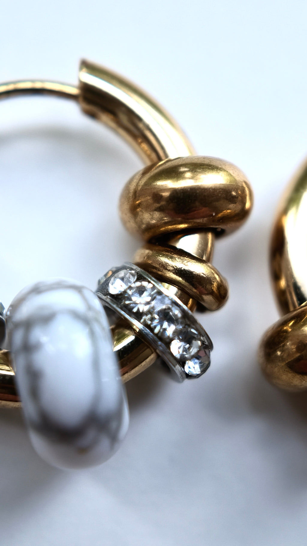 Asteria earrings from Omasi, made to order in Finland in surgical steel