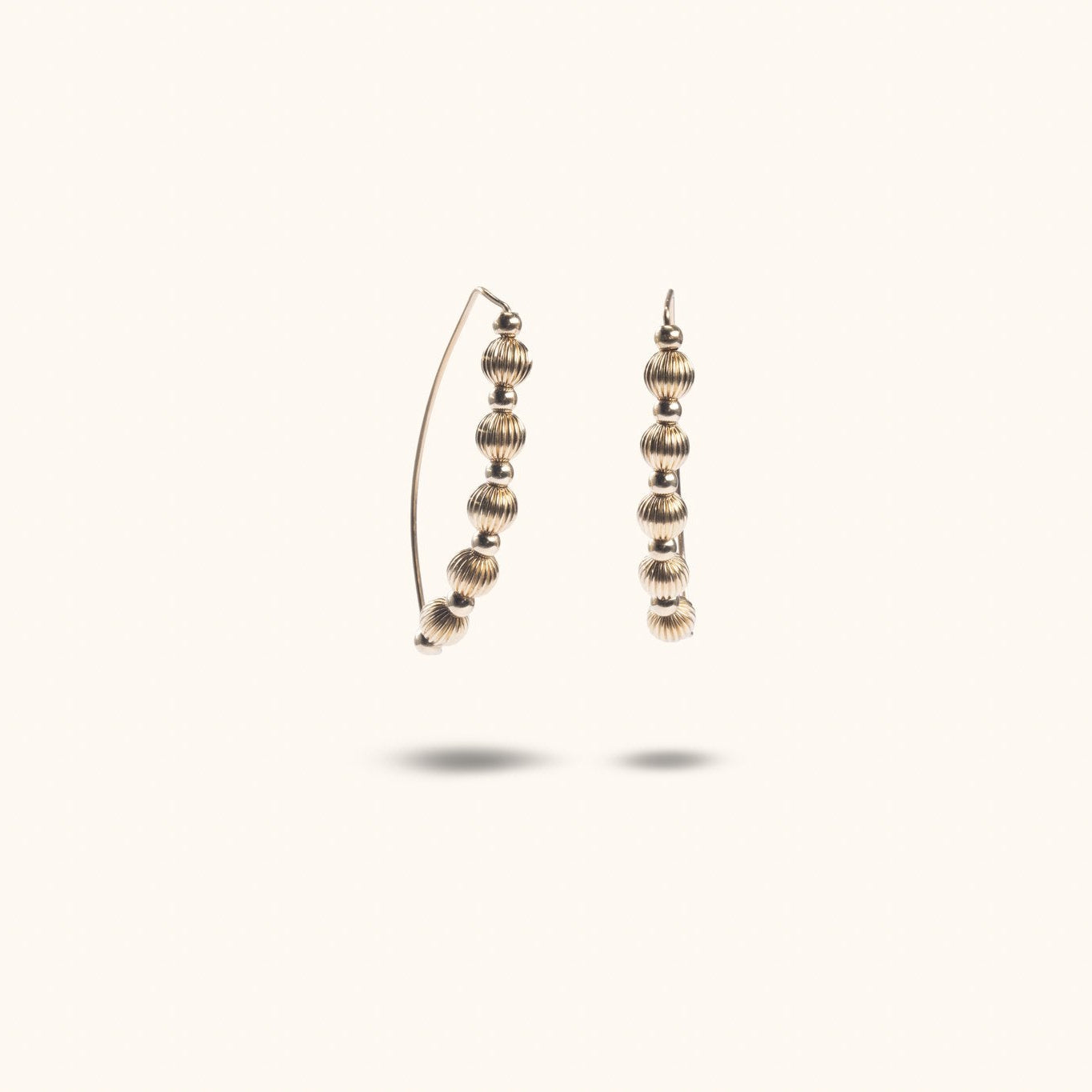 Livia wire earrings gold-filled with corrugated and smooth beads floating – Omasi Collection