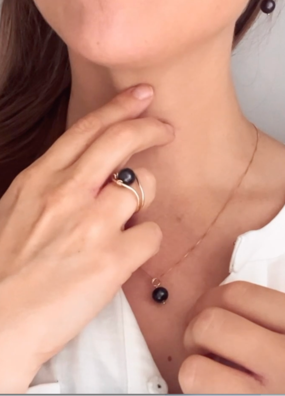 Luna pearl ring on model – gold-filled and sterling silver Omasi Collection