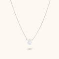 Máni moonstone pendant necklace flat lay – handmade jewellery Finland