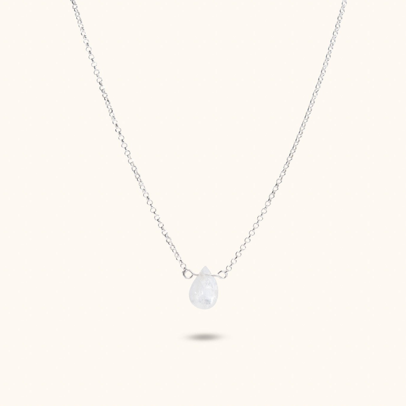 Máni moonstone pendant necklace flat lay – handmade jewellery Finland