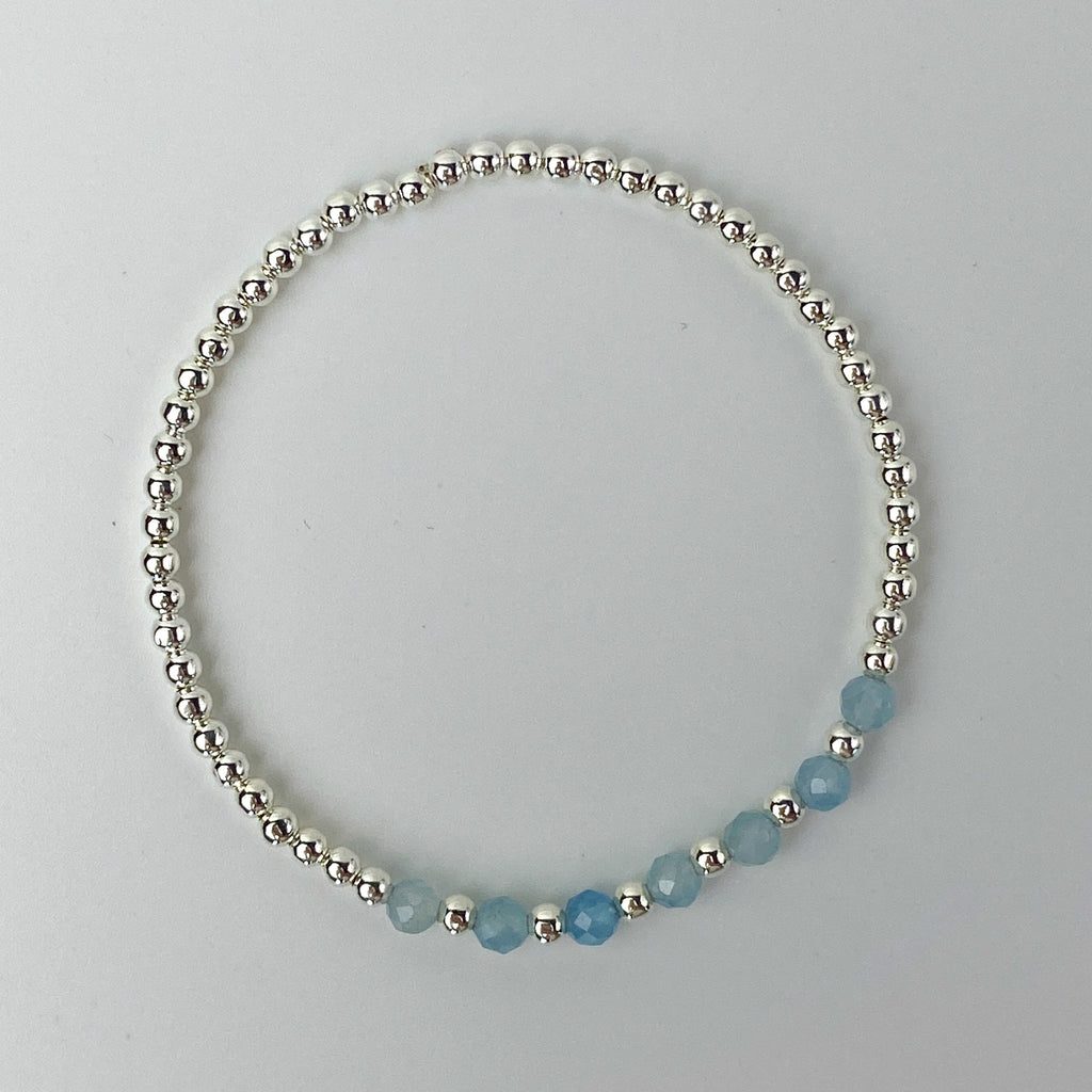 Sirena silver aquamarine bracelet flat lay – Omasi Collection Finland