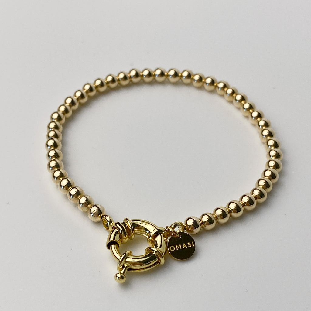 Solme bracelet close-up bead detail gold – Omasi Collection Finland