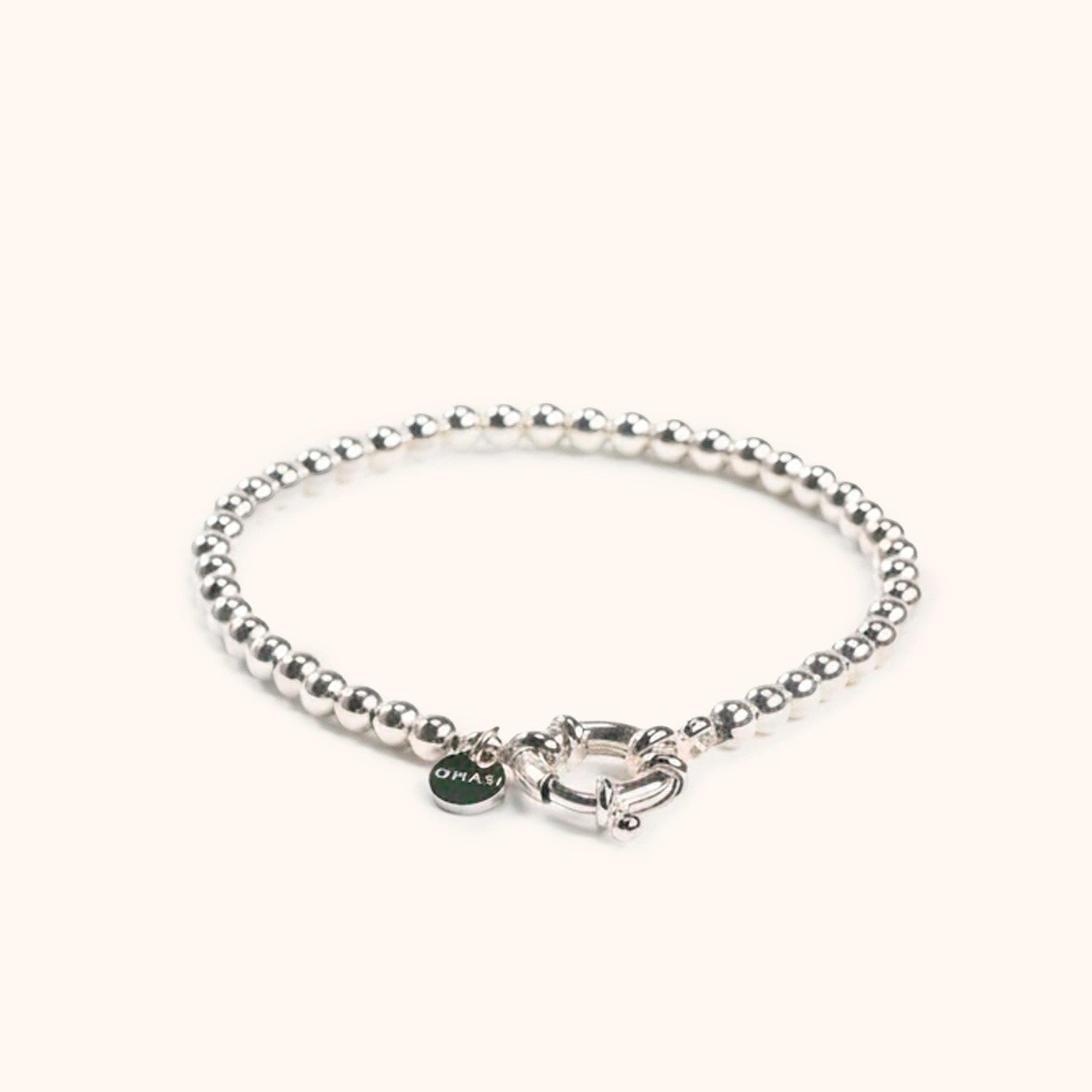 Solme sterling silver bracelet flat lay – Omasi Collection Finland