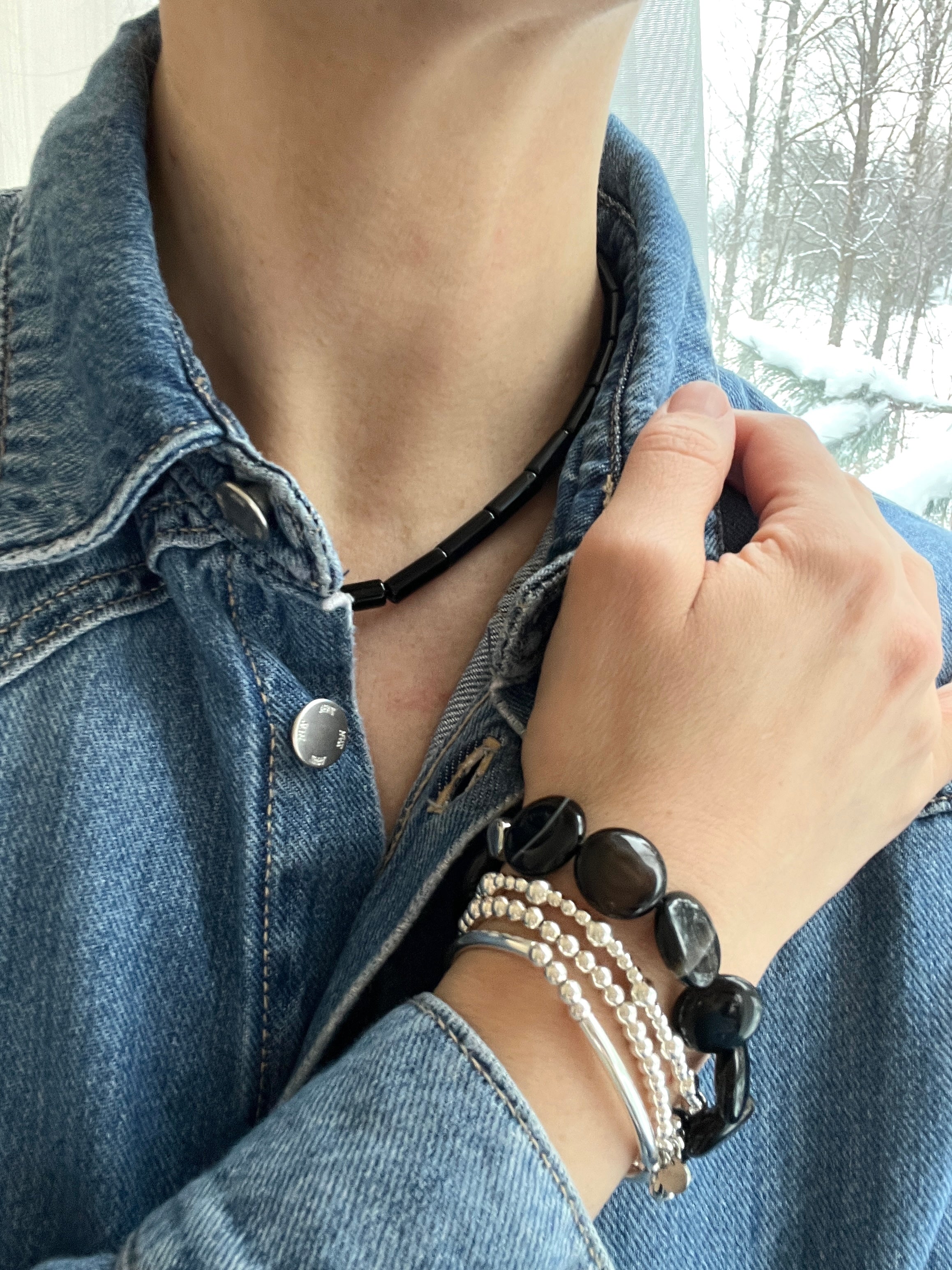 Sterling silver Linea onyx necklace on model – handmade minimalist jewellery Finland