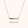 Sylva gold-filled bar necklace flat lay – Omasi Collection Finland
