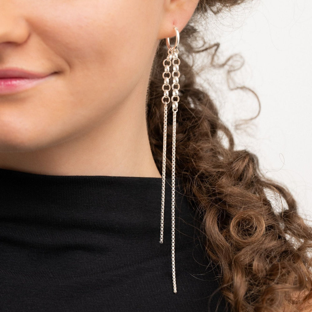 Vela Belcher chain drop earring on model – handmade statement jewellery Finland