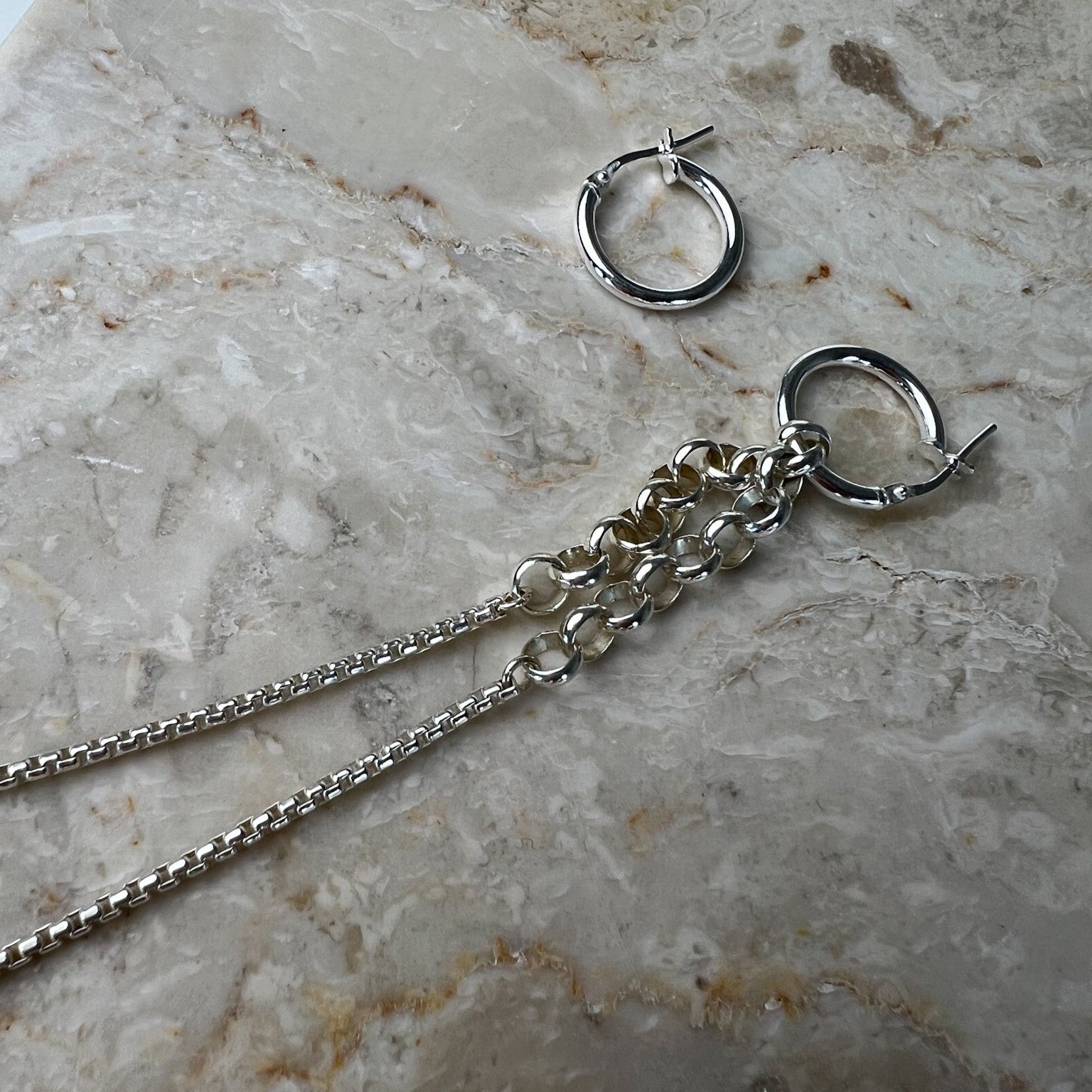 Vela earring close-up Belcher chain detail – handmade silver jewellery Finland