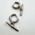 Mova gold tone T-bar hoop earrings in nickel-free surgical steel, flat lay – Omasi Collection