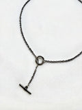 Mova silver tone loop necklace, close-up of the ring and T-bar drop in nickel-free surgical steel – Omasi Collection