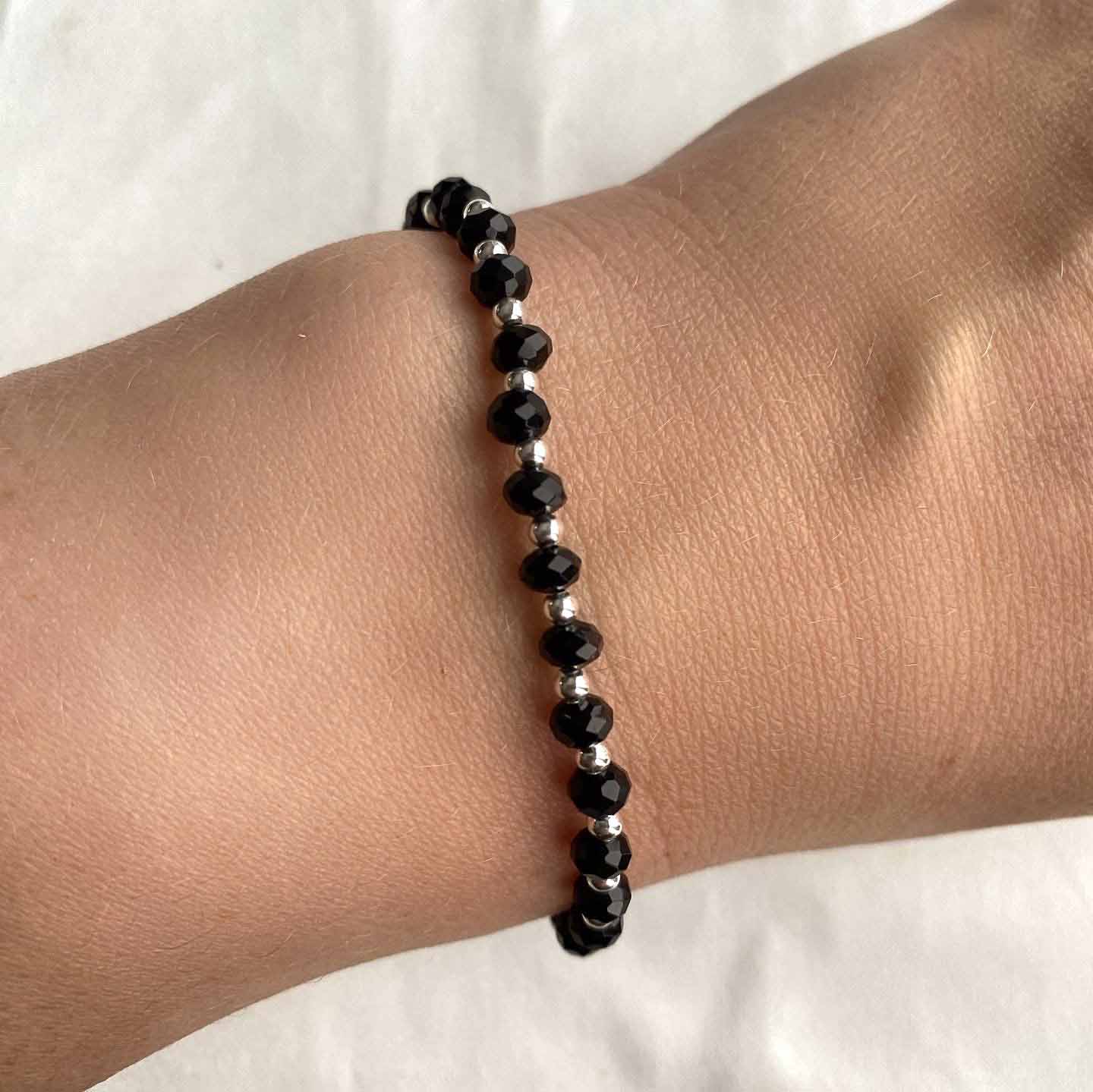 Verve black jade bracelet alone on wrist – Omasi Collection Finland
